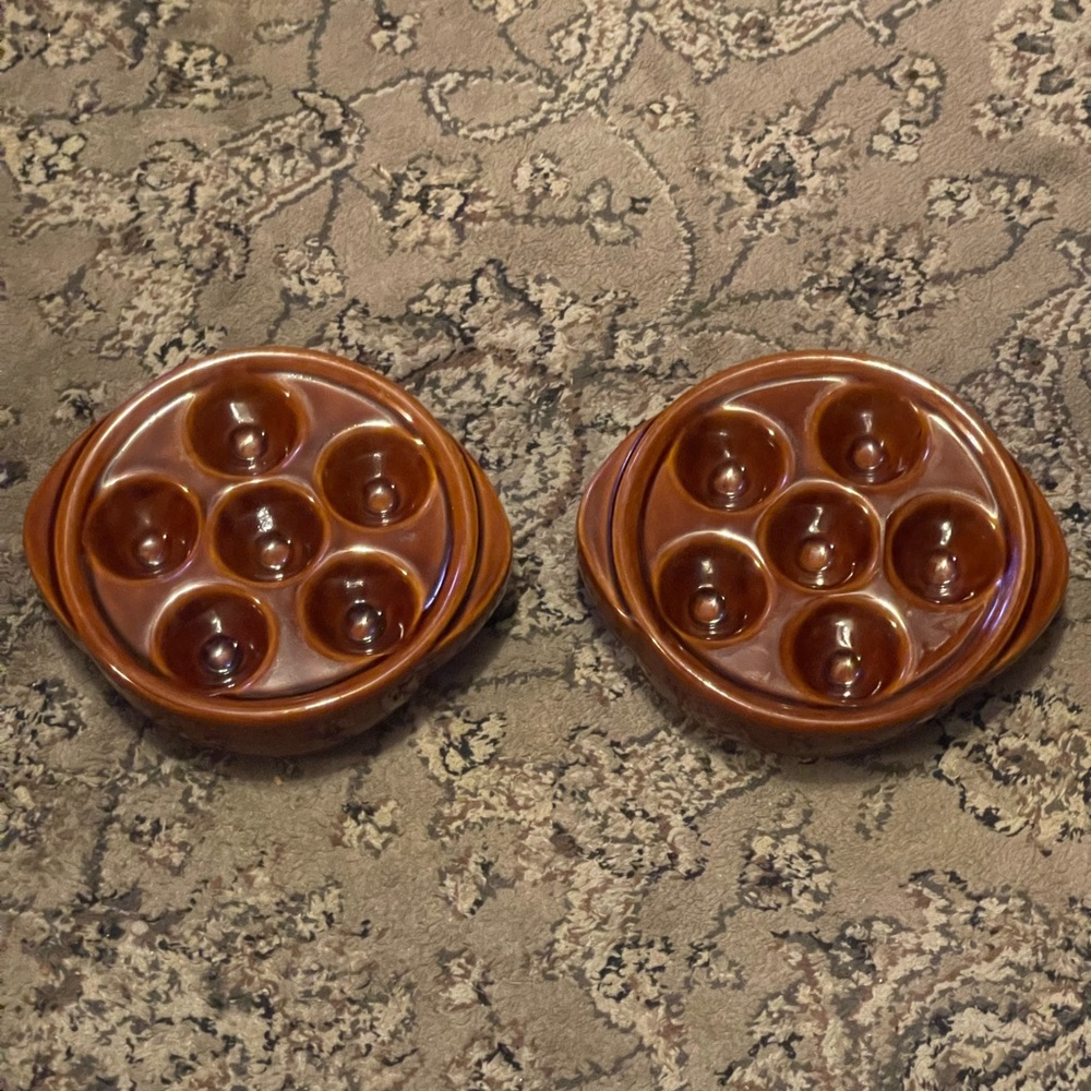 Set of Escargot, mushroom caps, quail eggs and more dishes